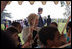 Lynne Cheney participates in a drumming activity with a group of fourth graders from local Fairfax County public schools during a Constitution Day 2005 celebration at George Washington's Mount Vernon Estate Friday, September 16, 2005. The event celebrates the anniversary of the signing of the U.S. Constitution 218 years ago. 