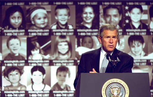  President George W. Bush addresses participants in the first-ever White House Conference on Missing, Exploited, and Runaway Children Wednesday, October 2,2002 at the Ronald Reagan Building and International Conference Center in Washington, D.C. The event helped raise public awareness of steps that parents, law enforcement, and communities can take to make America's children safer. White House photo by Paul Morse