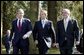 President George W. Bush walks with British Prime Minister Tony Blair, center, and Irish Prime Minister Bertie Ahern at Hillsborough Castle as he prepares to depart Northern Ireland Tuesday, April 8, 2003. White House photo by Paul Morse