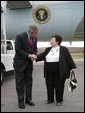 President George W. Bush talks with USA Freedom Corps Greeter Dolly Yunkunis in front of Air Force One in Wilkes-Barre, Pennsylvania, Friday, Oct. 22, 2004. White House photo by Eric Draper.