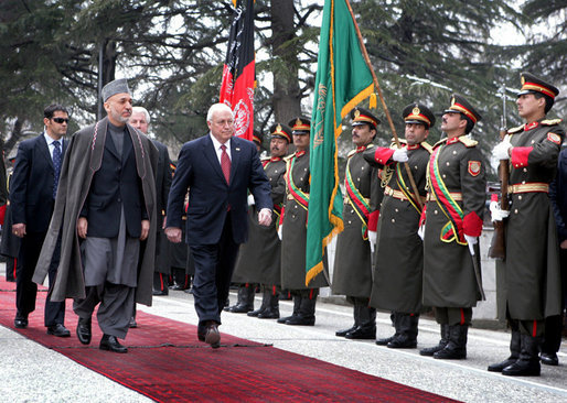 Vice President Dick Cheney and Afghan President Hamid Karzai review an honor guard, Tuesday, Feb. 27, 2007 during the Vice President's arrival to the presidential palace in Kabul. White House photo by David Bohrer