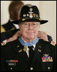 President George W, Bush presents the Medal of Honor to U.S. Army Major Bruce P. Crandall in the East Room of the White House, Monday, Feb. 26, 2007, for his extraordinary heroism as a 1st Cavalry helicopter flight commander in the Republic of Vietnam in November 1965. White House photo by Paul Morse