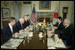 Vice President Dick Cheney holds a breakfast meeting with Japanese Chief Cabinet Secretary Yasuhisa Shiozaki and Japanese officials at the U.S. Ambassador's residence in Tokyo, Wednesday, February 21, 2007. Seated with the Vice President, from left, is Assistant to the Vice President for National Security Affairs John Hannah, U.S. Ambassador to Japan Thomas Schieffer, and Chief of Staff to the Vice President David Addington. White House photo by David Bohrer