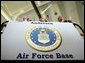 U.S. troops at Andersen Air Force Base, Guam listen from atop a hydraulic lift as Vice President Dick Cheney delivers remarks during a rally, Thursday, Feb. 22, 2007. White House photo by David Bohrer