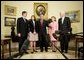 President George W. Bush is joined by Texas Senators Kay Bailey Hutchison, second from right, and John Cornyn, right, and Senate Leader Bill Frist (R-Tenn.), as they stand with Judge Priscilla Owen Tuesday, May 24, 2005, in the Oval Office. White House photo by Eric Draper