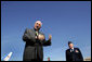 Vice President Dick Cheney, accompanied by General Mark Stogsdill, commander of the 94th Airlift Wing, addresses U.S. troops at Dobbins Air Force Base in Marietta, Ga., Monday, May 2, 2005. In his remarks, the Vice President thanked the troops and their families for their service.White House photo by David Bohrer