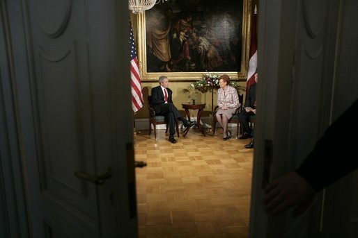 President George W. Bush and Latvia's President Vaira Vike-Freiberga meet at Riga Castle in Riga, Latvia, Saturday, May 7, 2005. White House photo by Eric Draper