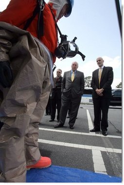 Vice President Dick Cheney and Department of Homeland Security Secretary Michael Chertoff watch a demonstration of an emergency worker donning protective gear during a visit to the Federal Law Enforcement Training Center in Glynco, Georgia, May 2, 2005.  White House photo by David Bohrer