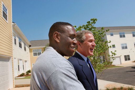 President George W. Bush and new home owner Al Smith tour Pryor Road Corridor Development in Atlanta, Georgia, Monday, June 17. White House photo by Eric Draper.