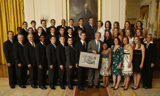 President George W. Bush stands with members of the Ohio State University Men's and Women's Fencing Team at the White House on Tuesday, June 24, 2008, during the visit of the 2007 and 2008 NCAA Sports Champions. White House photo by Eric Draper
