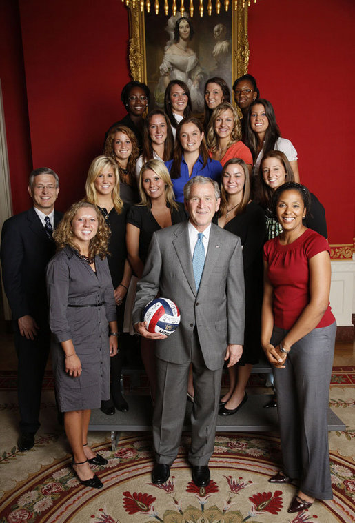 President George W. Bush poses with members of the Pennsylvania State University Women's Volleyball Team in the Red Room of the White House during the June 24, 2008, visit of the 2007 and 2008 NCAA Sports Champions. White House photo by Eric Draper