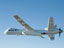 With its thermal-infared sensor pod under its left wing, NASA's Ikhana unmanned aircraft cruises over California during the Western States Fire Mission.