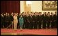 Laura Bush and Madame Liu, wife of President Hu Jintao of China, participate in the welcoming ceremony for President and Mrs. Bush Sunday, Nov. 20, 2005, at the Great Hall of the People in Beijing. White House photo by Eric Draper