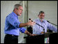 President George W. Bush speaks during a joint press statement with Brazilian President Luiz Inacio Lula da Sliva at the Granja do Torto in Brasilia, Brazil, Sunday, Nov. 6, 2005. White House photo by Paul Morse