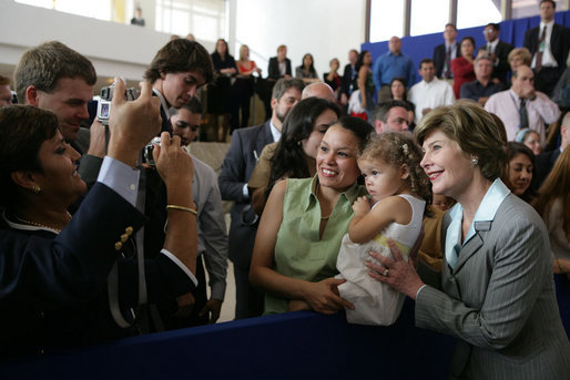 Laura Bush smiles as she greets staff and families at the U.S. Embassy in Brasilia, Brazil Saturday, Nov. 6, 2005. White House photo by Krisanne Johnson