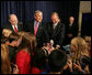 President George W. Bush invites children on stage, Tuesday, November 22, 2005, to pet "Marshmallow", the National Thanksgiving Turkey, at the official pardoning of the turkey at the Eisenhower Executive Office Building in Washington. White House photo by David Bohrer