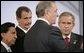 Canada's Prime Minister Paul Joseph Martin has the attention of President George W. Bush and fellow leaders of the Americas Friday, Nov. 18, 2005, as they meet at the Chosun Westin Hotel in Busan, Korea. Listening are, from left: Peru President Alejandro Toledo and Mexico President Vincente Fox. White House photo by Eric Draper