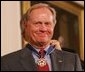 President Bush presents PGA champion Jack Nicklaus with the Presidential Medal of Freedom Wednesday, Nov. 9, 2005, during ceremonies at the White House. White House photo by Shealah Craighead