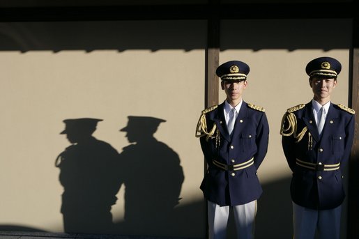 Japanese military honor guards stand at attention at the Guest House in Kyoto, Japan Wednesday, Nov. 16, 2005, where President and Mrs. Bush spent the night before attending the U.S.-Japan summit. White House photo by Eric Draper