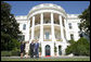 President George W. Bush and Laura Bush welcome the Prince of Wales and Duchess of Cornwall to the White House, Wednesday, Nov. 2, 2005. White House photo by Paul Morse