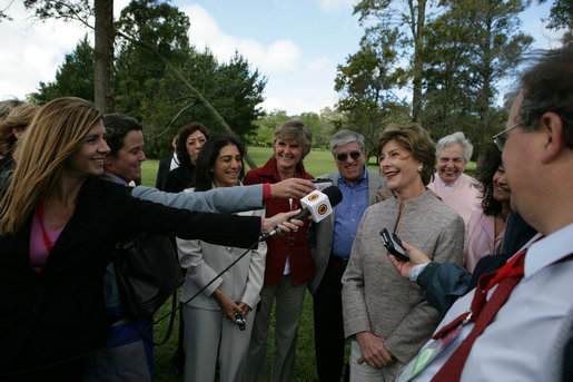 Mrs. Laura Bush smiles as she talks with the media after lunching Friday, Nov. 4, 2005, at Estancia Santa Isabel, an Argentine ranch located not far from Mar del Plata, where President George W. Bush was participating in the 2005 Summit of the Americas. White House photo by Krisanne Johnson