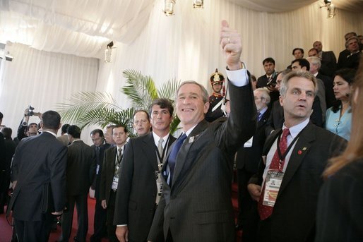 President George W. Bush gives the thumbs-up to well-wishers Friday, Nov. 4, 2005, as he attended the opening ceremonies of the 2005 Summit of the Americas at the Teatro Auditorium in Mar del Plata, Argentina. White House photo by Eric Draper