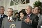 President George W. Bush stands with Secretary of Defense Donald Rumsfeld; Secretary of Labor Elaine Chao and Mike Leavitt, Secretary of Health and Human Services, as he speaks to the media from the Rose Garden of the White House regarding the devastation along the Gulf Coast caused by Hurricane Katrina. White House photo by Paul Morse