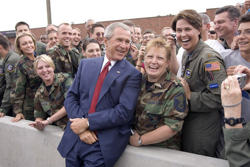 After addressing the Veterans of Foreign Wars national convention, President George W. Bush chats with troops from the Utah National Guard shortly before departing Salt Lake City, Utah, August 22, 2005. White House photo by Paul Morse