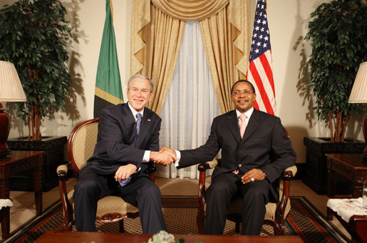President George W. Bush and President Jakaya Kikwete of Tanzania shake hands before the start of their meeting Sunday, Feb. 17, 2008, at the State House in Dar es Salaam. White House photo by Eric Draper
