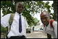 Little boys in school uniforms pose for a photo, Monday, February 18, 2008 in the Tanzanian capitol of Dar es Salaam. White House photo by Chris Greenberg