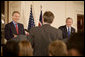 President George W. Bush and British Prime Minister Tony Blair participate in a joint news conference Thursday evening May 25, 2006 in the East Room of the White House, where the two leaders vowed their support to the new government of Iraq. White House photo by Eric Draper