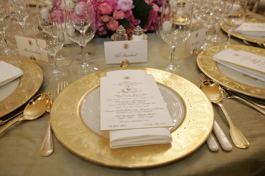 The dinner setting for President George W. Bush is seen Tuesday, May 16, 2006, in the State Dining Room of the White House for the official dinner in honor of Australian Prime Minister John Howard and his wife Janette Howard. White House photo by Shealah Craighead
