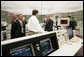 President George W. Bush meets workers in the control room at the Limerick Generating Station in Limerick, Pa., Wednesday, May 24, 2006 , where President Bush addressed an audience urging the the advancement of nuclear energy as part of a diversified U.S. energy policy. White House photo by Kimberlee Hewitt