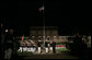 President George W. Bush stands for the March in Command Review during an Evening Parade, May 5, 2006, at the Marine Barracks in Washington, D.C. White House photo by Paul Morse