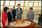 Mrs. Lynne Cheney looks at a display Friday, May 5, 2006, commemorating the first Congress of World Religions, an initiative of President Nazarbayev, that was held in Astana, Kazakhstan in 2003. With her from left are: Murat Gabdrashitov Sapargaliyev, director of Biterek; Maryjo Ordway, wife of John Ordway, U.S. Ambassador to Kazakhstan, and Sabilya Mustafina, deputy Mayor of Astana. Photo by Aleksandr Zhabchuk 