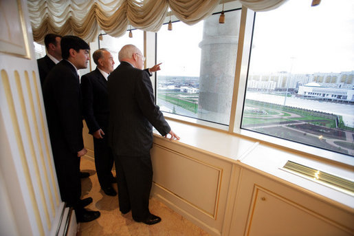 From a high window in the Presidential Palace, Kazakh President Nursultan Nazarbayev points out places of interest along the Astana, Kazakhstan skyline, Friday, May 5, 2006. White House photo by David Bohrer