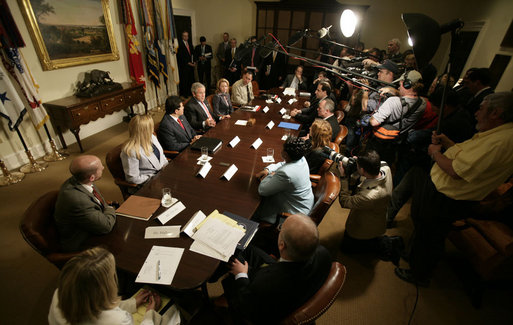 Members of the media gather as President George W. Bush meets with Victims of Identity Theft Wednesday, May 10, 2006, in the Roosevelt Room of the White House. White House photo by Eric Draper