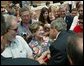 President George W. Bush greets the residents of Fort Smith, Ark., before heading back to Washington, D.C., Tuesday, May 11, 2004. White House photo by Paul Morse