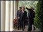 President George W. Bush and President Luiz Inacio Lula da Silva of Brazil walk along the colonnade in the Rose Garden Friday, June 20, 2003. White House photo by Paul Morse