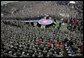 President George W. Bush delivers remarks to nearly 7,000 military personnel and families at Marine Corps Base Camp Pendleton, Calif., Tuesday, Dec. 7, 2004.White House photo by Eric Draper