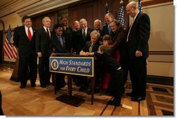 President George W. Bush signs H.R. 1350, the Individuals with Disabilities Education Improvement Act of 2004, in the Dwight D. Eisenhower Executive Office Building in Washington, D.C., Friday, Dec. 3, 2004.  White House photo by Tina Hager