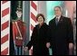 President George W. Bush and Laura Bush arrive at the Pageant of Peace to light the National Christmas Tree on the Ellipse near the White House Dec. 2, 2004. White House photo by Paul Morse.