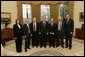 President George W. Bush meets with the 2004 Nobel Laureates in the Oval Office Dec. 1, 2004. Pictured with President Bush, from left, are Dr. Linda Buck, physiology and medicine; Finn Kydland, economics; Edward Prescott, economics; Frank Wilczek, physics; David Gross, physics; and Richard Axel, physiology and medicine.White House photo by Tina Hager