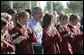 President George W. Bush joins members of the Jagdhornblaser Baremerhagen Band Thursday, July 13, 2006, prior to dinner in Trinwillershagen, Germany. The President and Mrs. Laura Bush depart Germany Friday for Russia and the G8 Summit. White House photo by Eric Draper