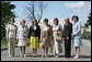 Spouses of G8 leaders pose for a photograph at Konstantinvosky Palace in Strelna, Russia, Sunday, July 16, 2006. From left, they are: Laura Bush; Bernadette Chirac, wife of French President Jacques Chirac; Sousa Uva Barroso, wife of European Commission President Jose Manuel Barroso; Flavia Franzoni, wife of Italian Prime Minister Romano Prodi, Lyudmila Putina, wife of Russian President Vladimir Putin; Laureen Harper, wife of Canadian Prime Minister Stephen Harper; and Cherie Booth, wife of United Kingdom Prime Minister Tony Blair. White House photo by Shealah Craighead