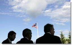 President George W. Bush, center, meets with Prime Minister Tony Blair of the United Kingdom on Konstantinovsky Palace Complex during the G8 Summit in Strelna, Russia, Sunday, July 16, 2006. White House photo by Eric Draper