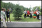 Mrs. Laura Bush and Mrs. Lyudmila Putina are greeted by a traditional Russian Folk group as they arrive at the Podvoriye Restaurant Saturday, July 15, 2006, in St. Petersburg, Russia. White House photo by Shealah Craighead