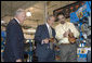 President George W. Bush watches how a shoe heel is formed at the Allen-Edmonds Shoe Corporation in Port Washington, Wis., Tuesday, July 11, 2006. After touring the company, President Bush addressed the press, "So the tax cuts we passed have helped this company. It made a lot of sense. They've also helped our country. This economy of ours is growing. The unemployment rate is 4.6 percent nationally." White House photo by Kimberlee Hewitt