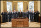 President George W. Bush welcomes members of the U.S. Air Force Thunderbirds to the Oval Office, Friday, Oct. 13, 2006. The Thunderbirds are scheduled to perform a fly over for the opening of the Air Force Memorial in Arlington, Va., Saturday, Oct. 14, 2006. White House photo by Eric Draper