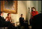 Mrs. Laura Bush smiles at Gerry Kohler, recipient of the 2006 Preserve America History Teacher of the Year award, while delivering remarks during a ceremony at the Union League Club in New York City, Thursday, October 5, 2006. Mrs. Kohler is a teacher at VanDevender Junior High School in West Virginia. Also shown are Dr. James Basker, President, Gilder Lehrman Institute of American History, left, and Patrick Shahan and Elizabeth Corbit, students of Mrs. Kohler’s. White House photo by Shealah Craighead